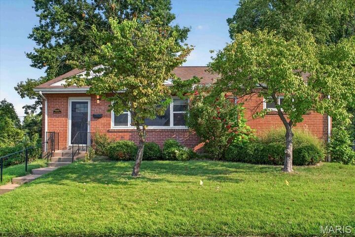 Property Photo:  8561 Everett Avenue  MO 63117 