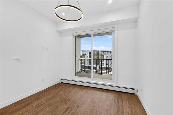 Property Photo:  265 Wolf Willow Boulevard SE 2412  AB T2X 6R1 