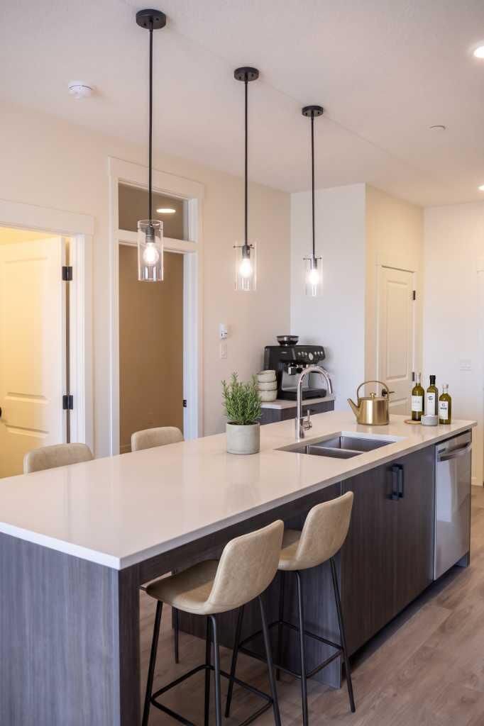 Property Photo:  47 Creekview Gardens 1305  AB T2X 6K7 