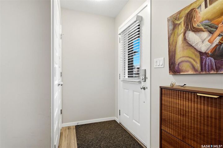 Property Photo:  8008 Canola Avenue  SK S4Y 0E7 