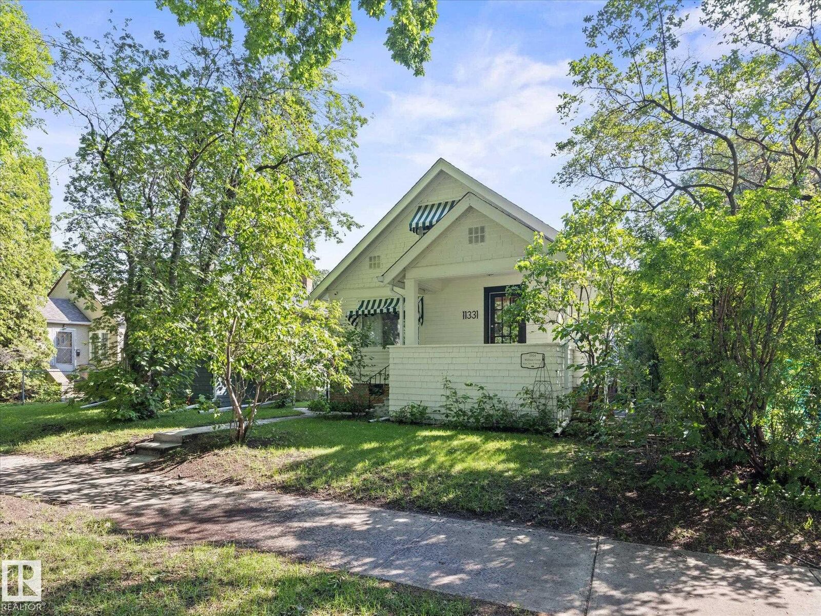 Property Photo:  11331 66 Street NW  AB T5B 1H5 