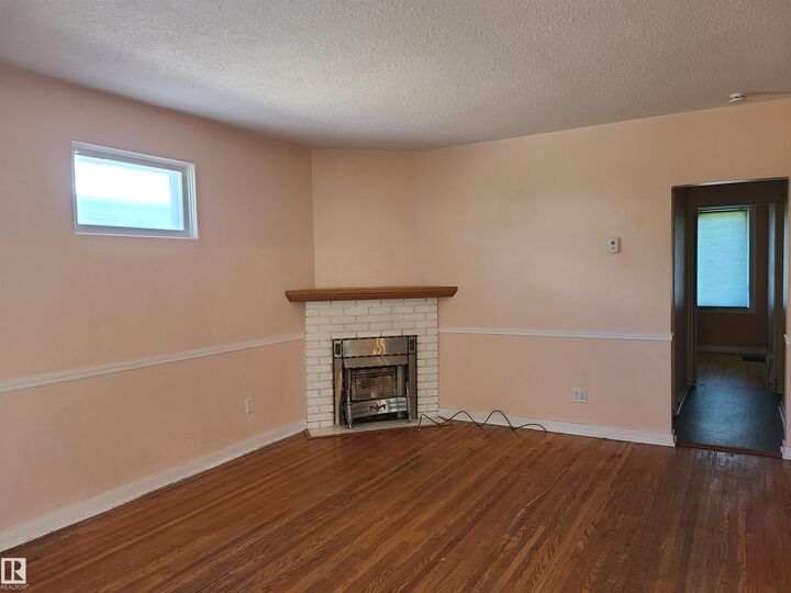 Property Photo:  11143 127 Street NW  AB T5M 0T5 