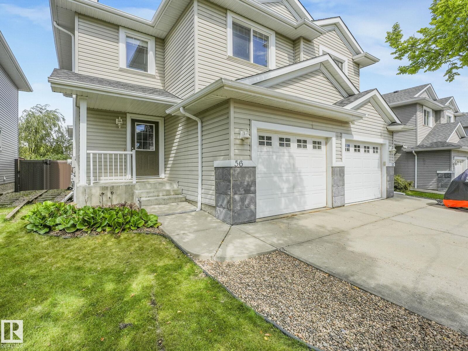 Property Photo:  1428 Hodgson Way NW 56  AB T6R 3P8 