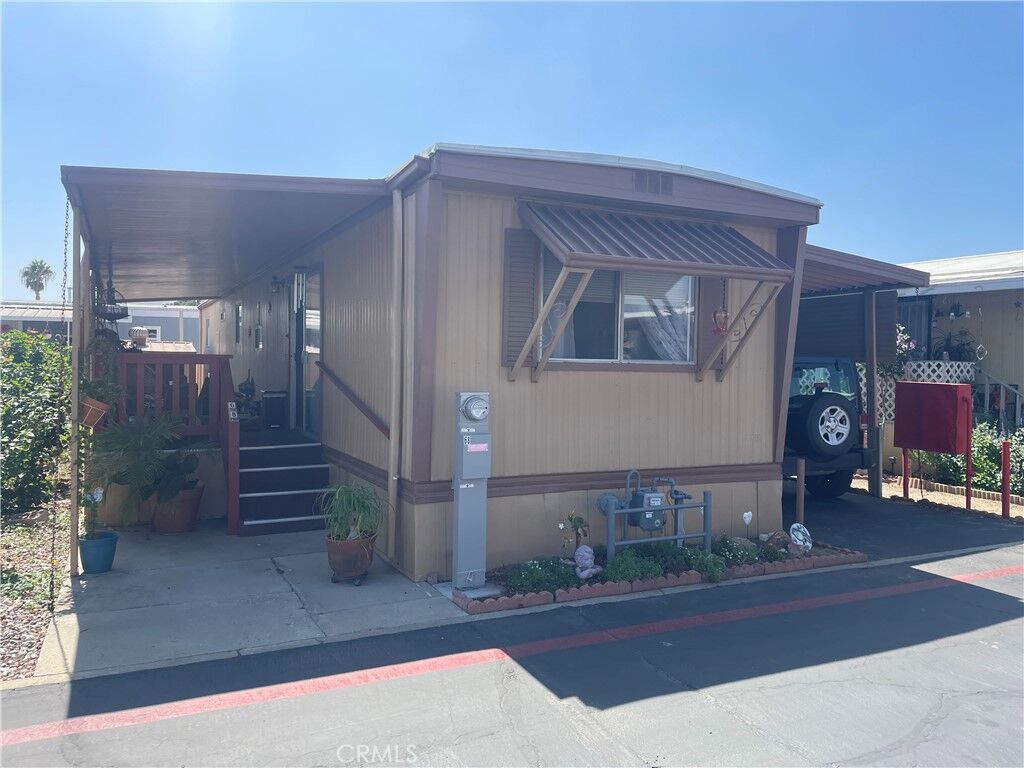 Property Photo:  17455 Marygold Avenue 68  CA 92316 
