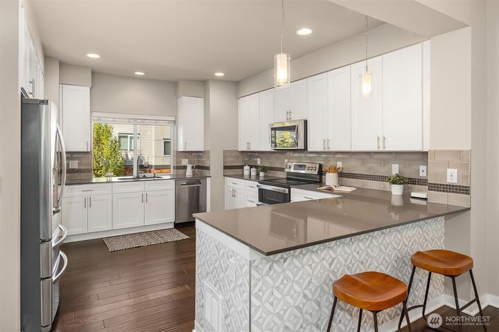 Property Photo:  19225  Damson Road D4  WA 98036 