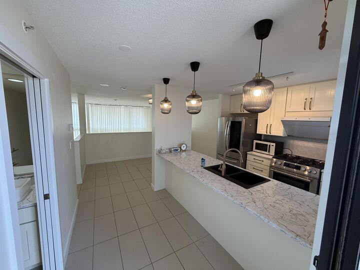 Property Photo: 7911 Ackroyd Road 1 BC V6X 4L6