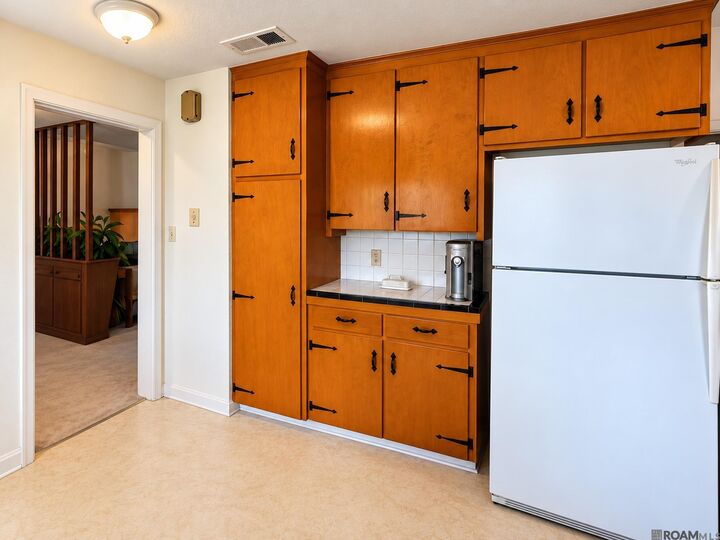 Property Photo:  9865 Miraflores Dr  LA 70815 
