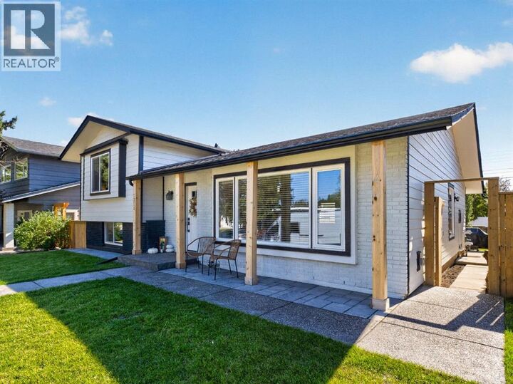 Property Photo:  1215 Lake Twintree Drive Southeast  AB T2J 2W9 