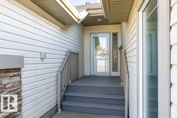 Property Photo: 4 Heritage Way 11 AB T8N 6W3