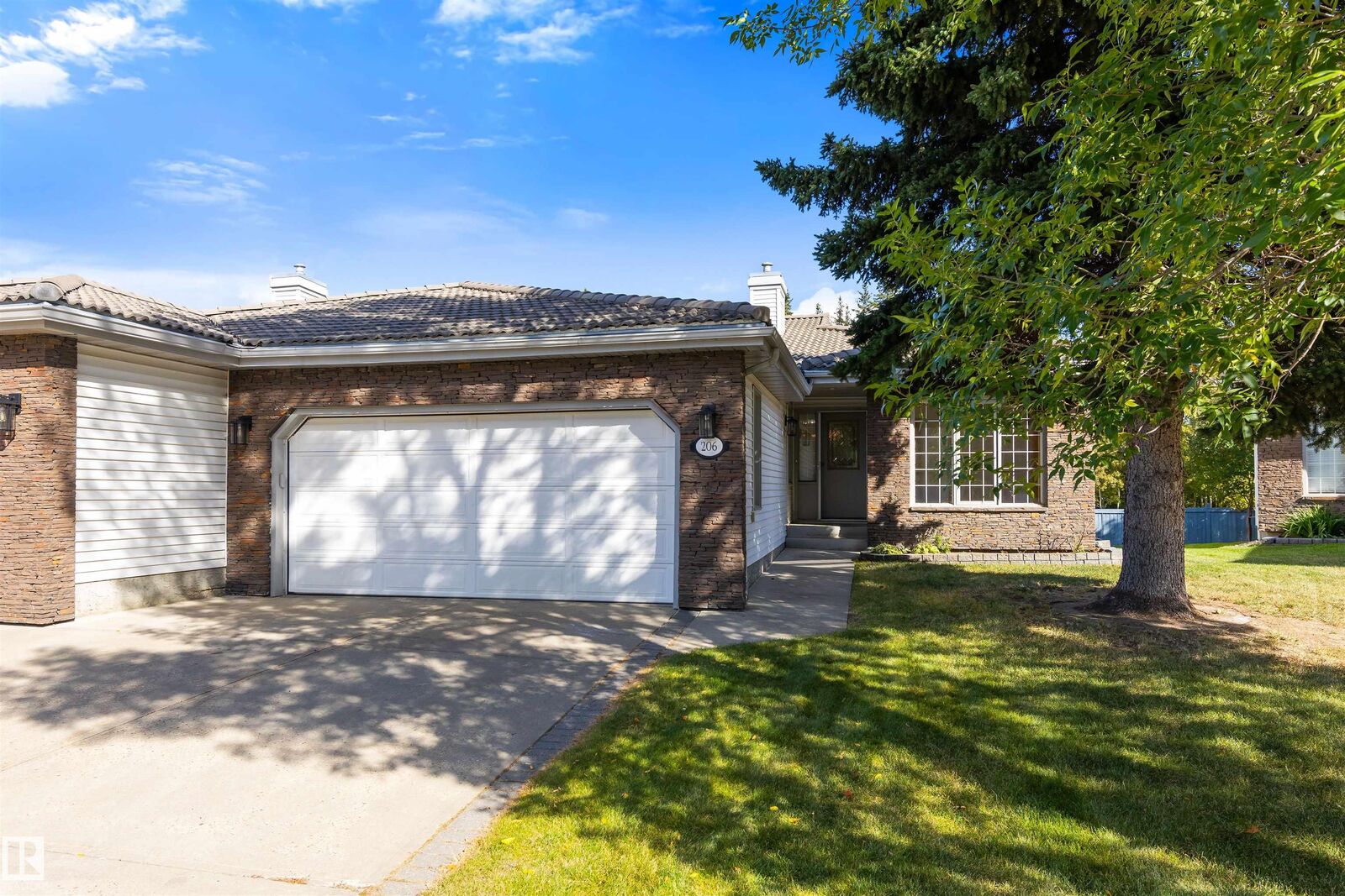 Property Photo:  206 Country Club Point(E) NW  AB T6M 2J6 