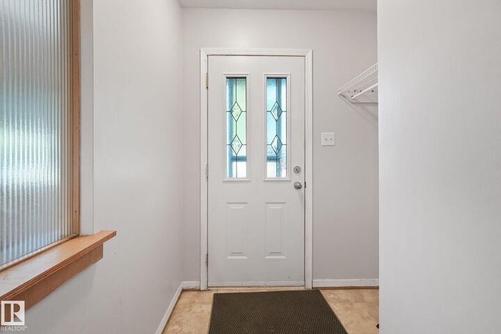Property Photo:  11507 135 Street NW  AB T5M 1K9 