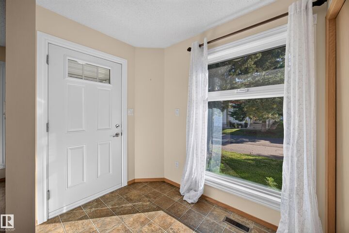 Property Photo:  9129 Garden Road  AB T8N 5N3 