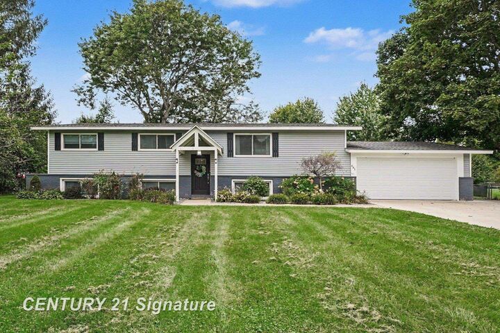 Property Photo:  481 N 5 Mile Road Road  MI 48640 