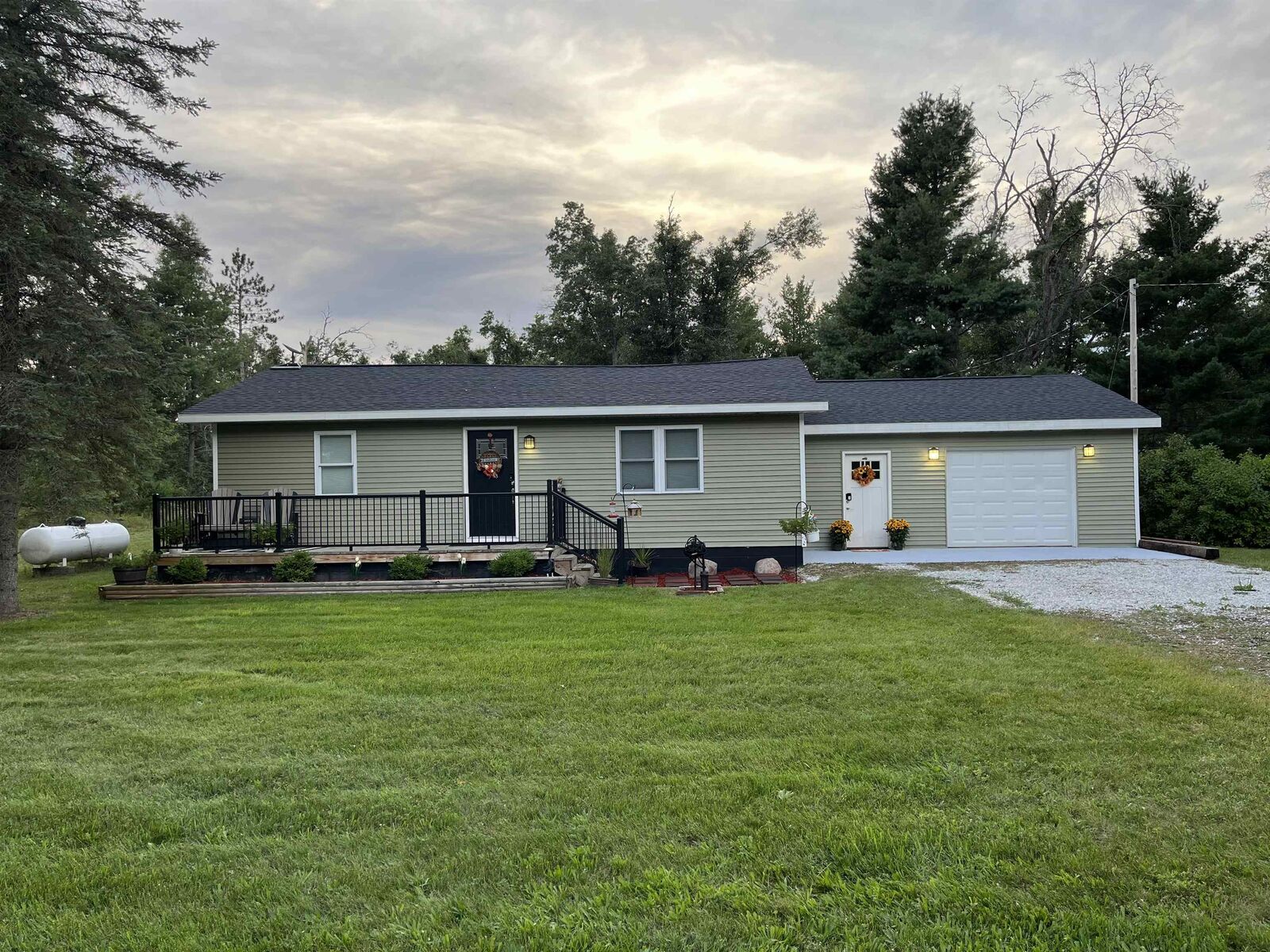 Property Photo:  11706 Crapo Lake Road  MI 49738 