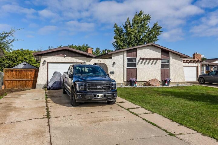Property Photo: 76 Cypress Way SE AB T1B 1G8