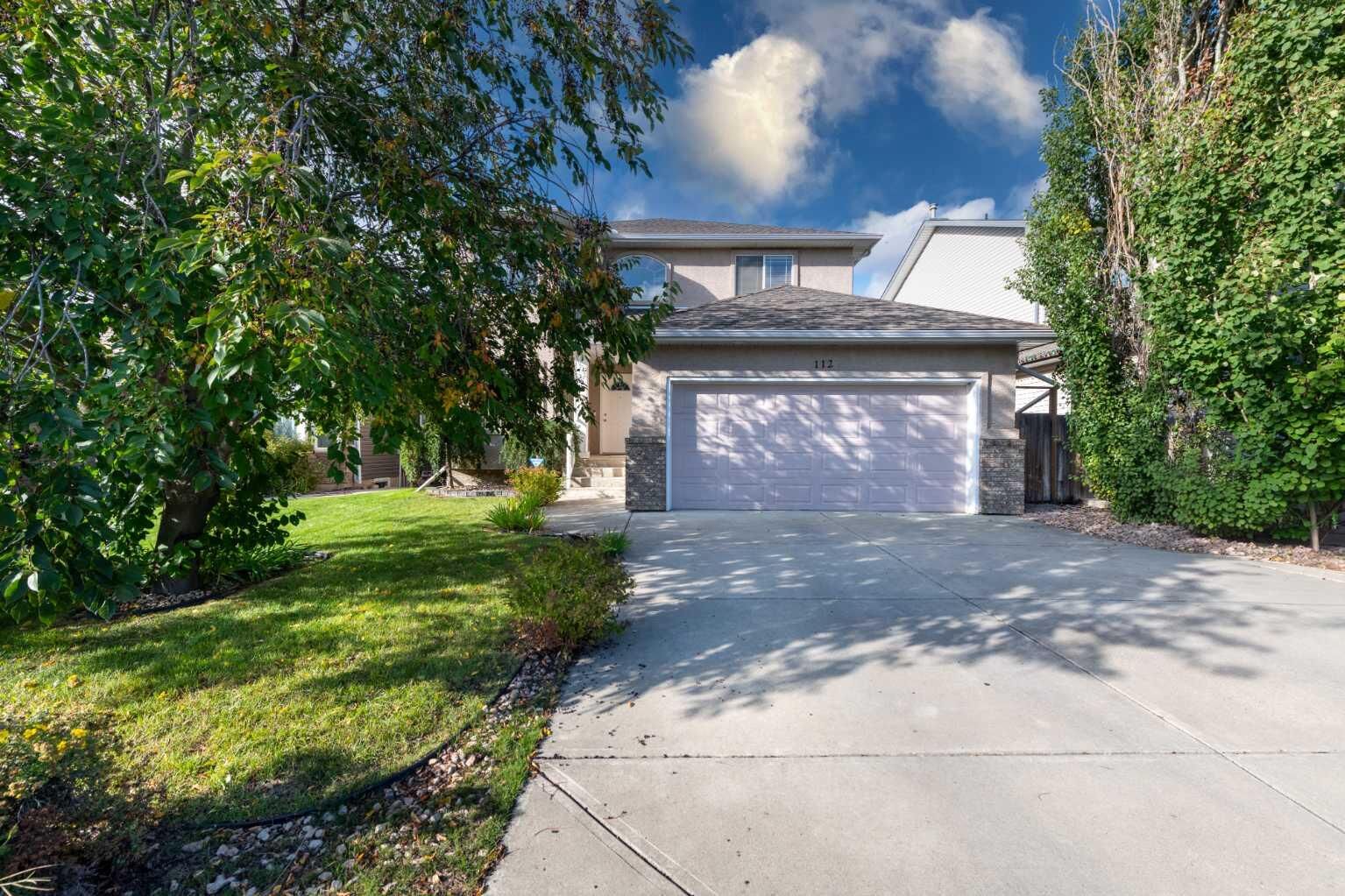 Property Photo: 112 Cove Crescent AB T1X 1J5