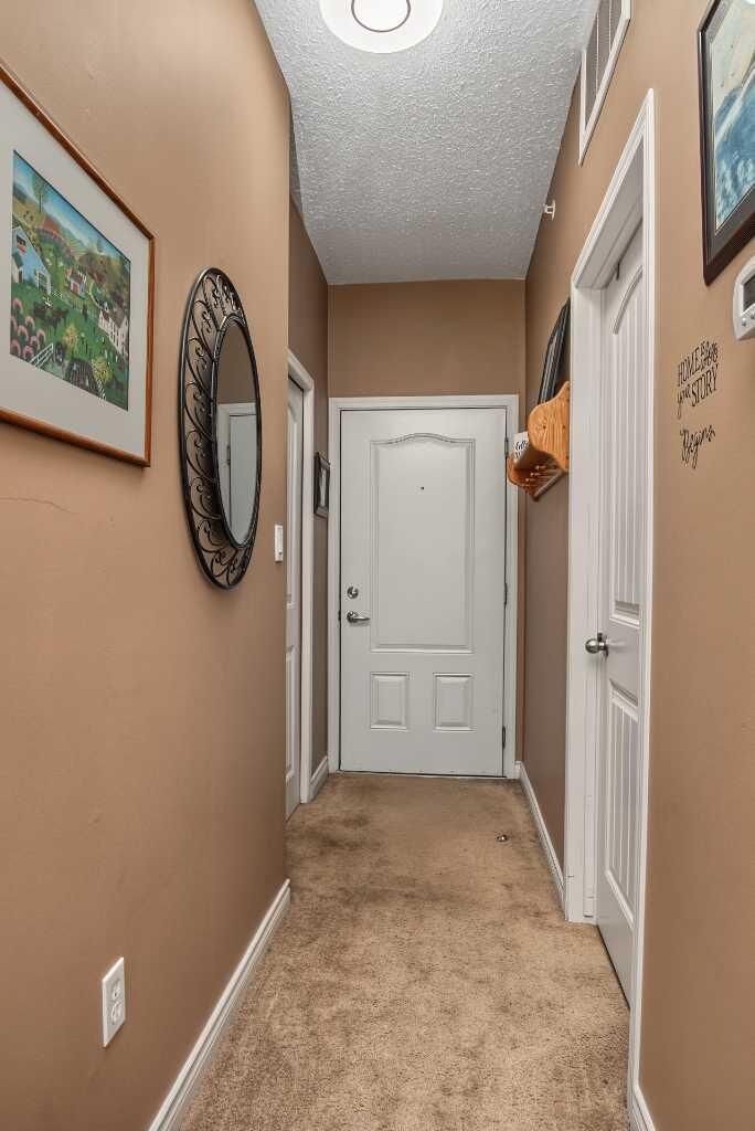 Property Photo: 9221 Lakeland Drive 406 AB T8X 0B8
