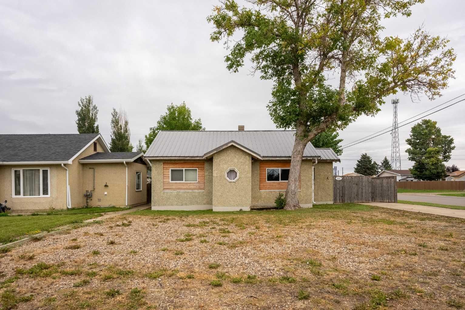 Property Photo:  5603 56 Street  AB T1G 1L4 