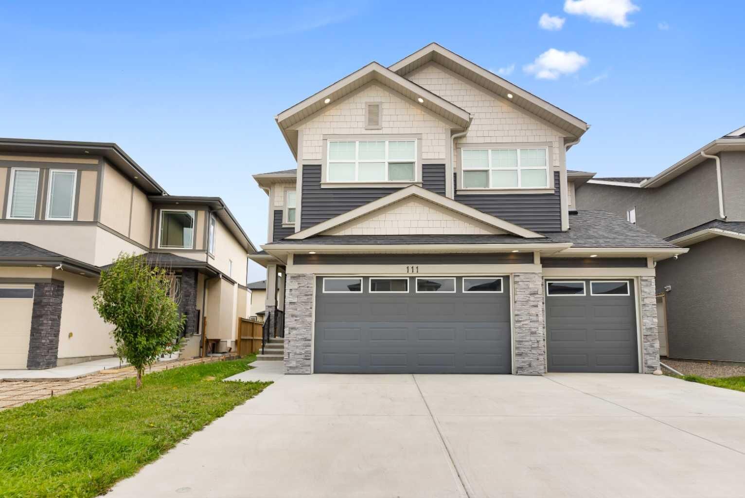 Property Photo:  111 Sandpiper Park  AB T1X 1Y8 