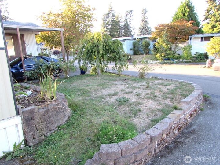 Property Photo: 5220 176th Street SW 28 WA 98037