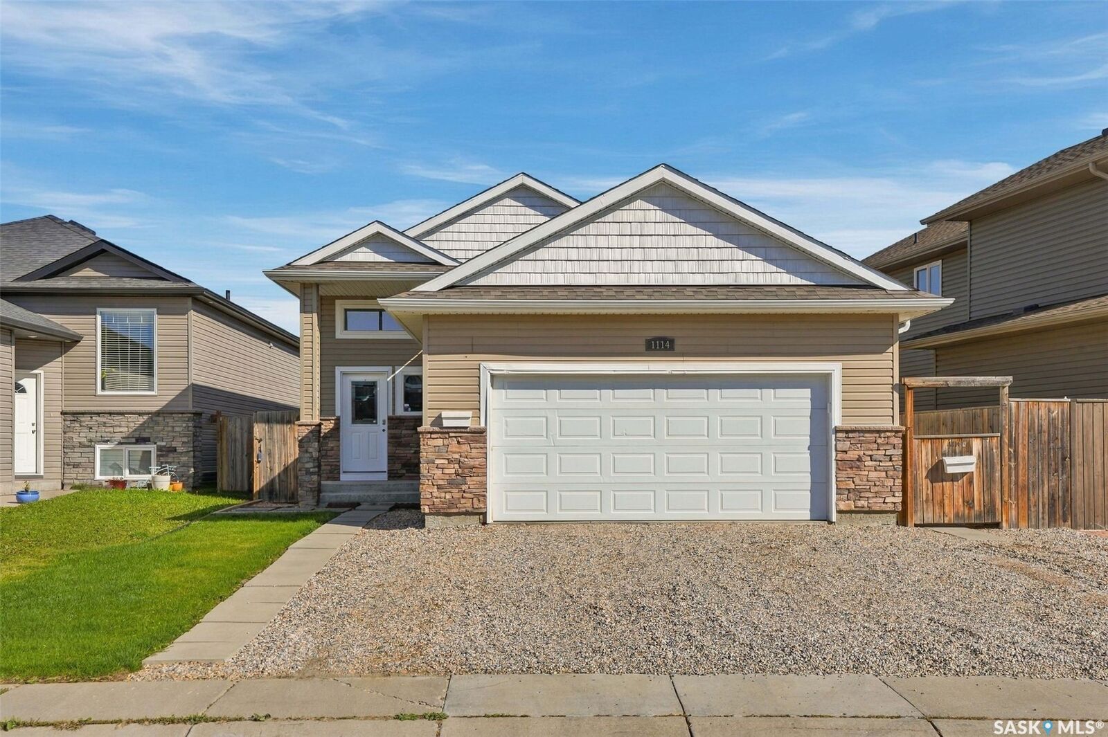 Property Photo:  1114 Hargreaves Way  SK S7R 0H2 