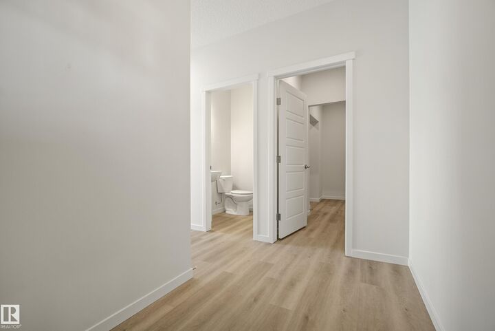 Property Photo:  20739 24 Avenue NW  AB T6M 2J7 