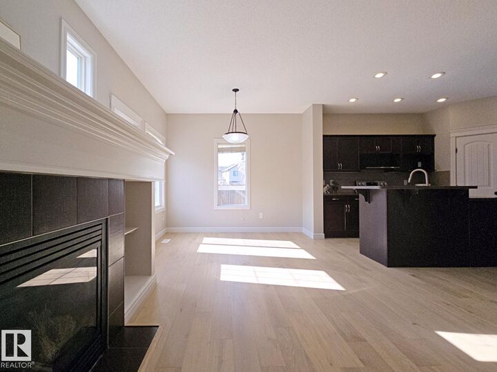 Property Photo: 11525 18A Avenue SW AB T6W 2E6
