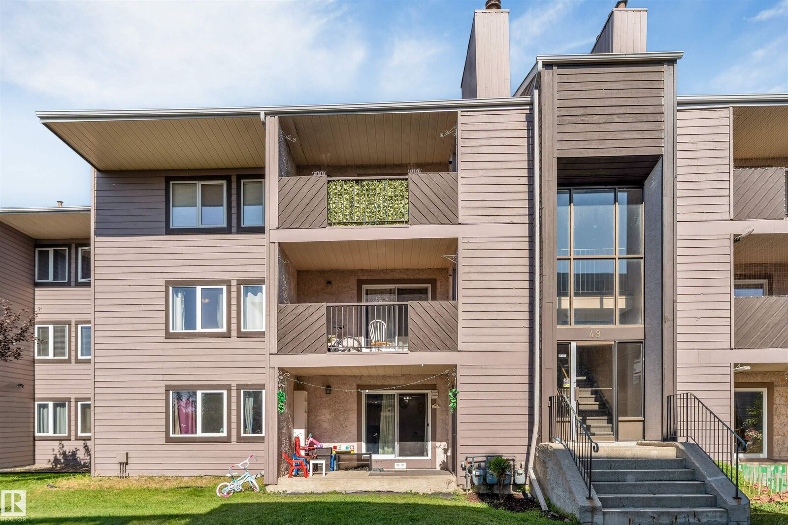 Property Photo:  49 Akins Drive 101  AB T8N 3M6 