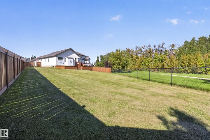 Property Photo:  27 Silverstone Drive  AB T7Z 0E8 