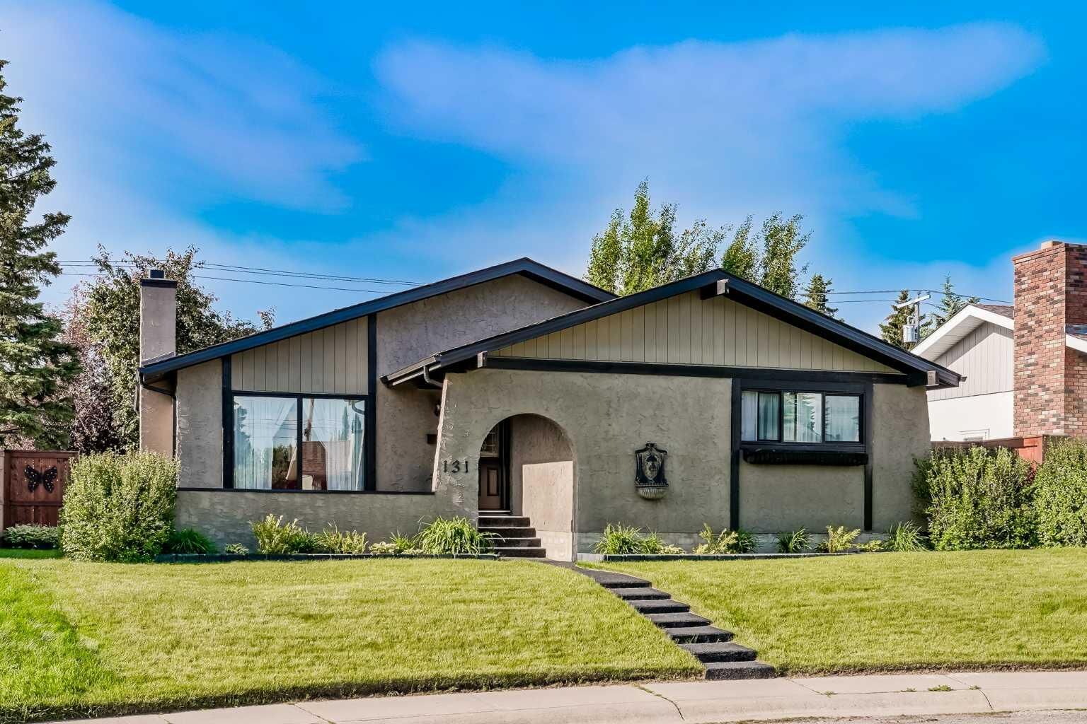 Property Photo: 131 Cedarpark Drive SW AB T2W 2J2
