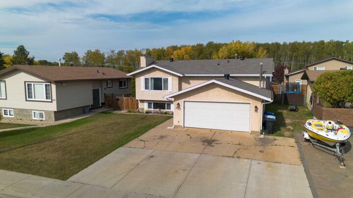 Property Photo:  307 Cochrane Crescent  AB T9K 1J2 