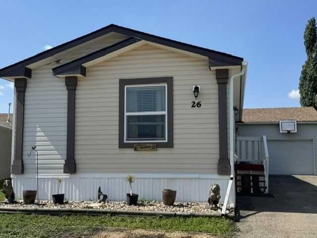Property Photo: 15 Mackenzie Ranch Way 26 AB T4L 0A7