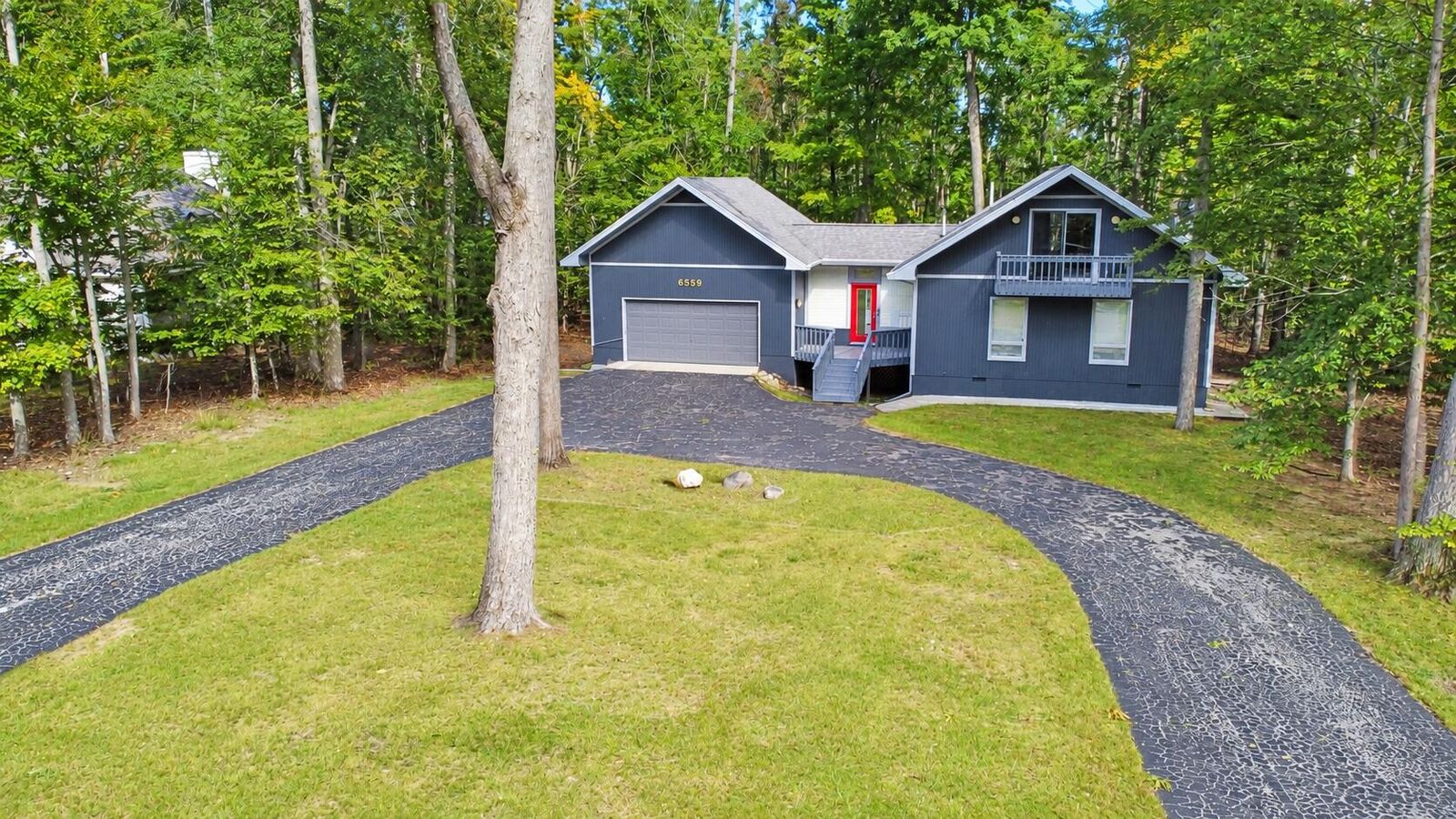 Property Photo: 6559 Forest Park Trail MI 49735