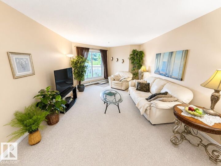 Property Photo:  9932 100 Avenue 109  AB T8L 4L2 