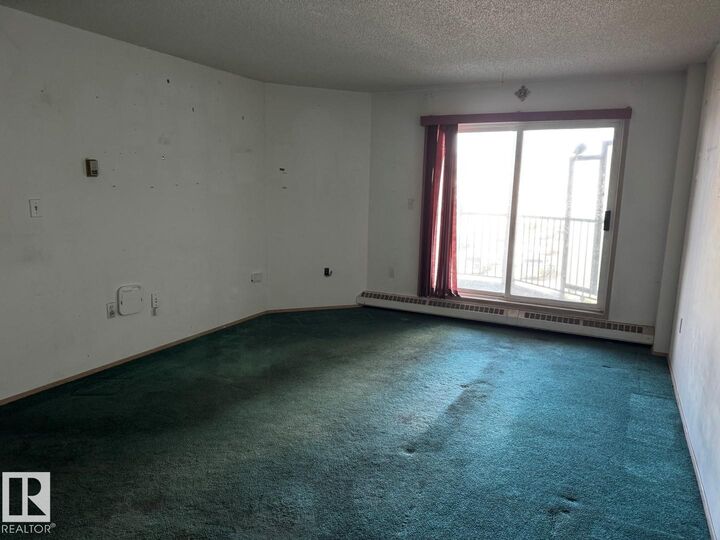 Property Photo:  9620 174 Street NW 303  AB T5T 6B9 