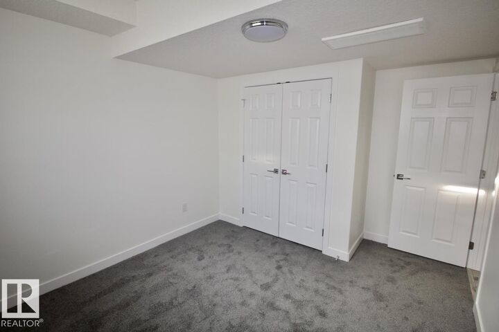Property Photo:  8841 Carson Way SW Bsmt  AB T6W 5B8 