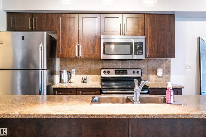 Property Photo:  111 Ambleside Drive SW 206  AB T6W 0J4 