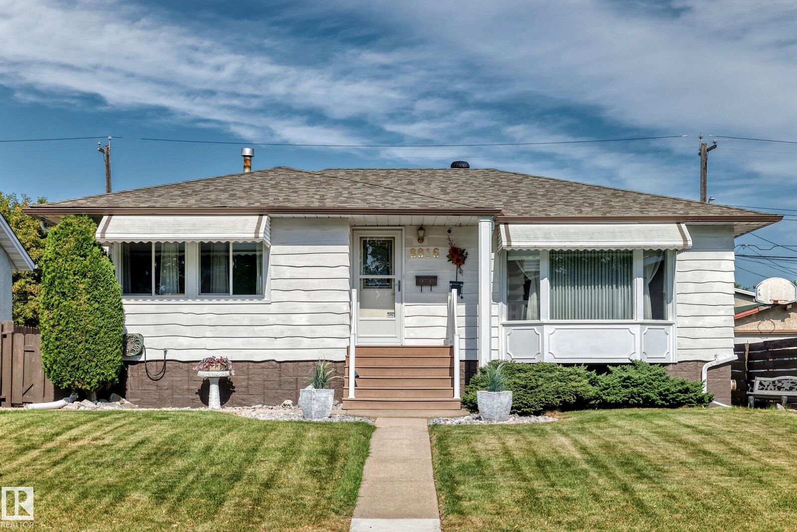 Property Photo:  8816 131A Avenue NW  AB T5E 0X2 