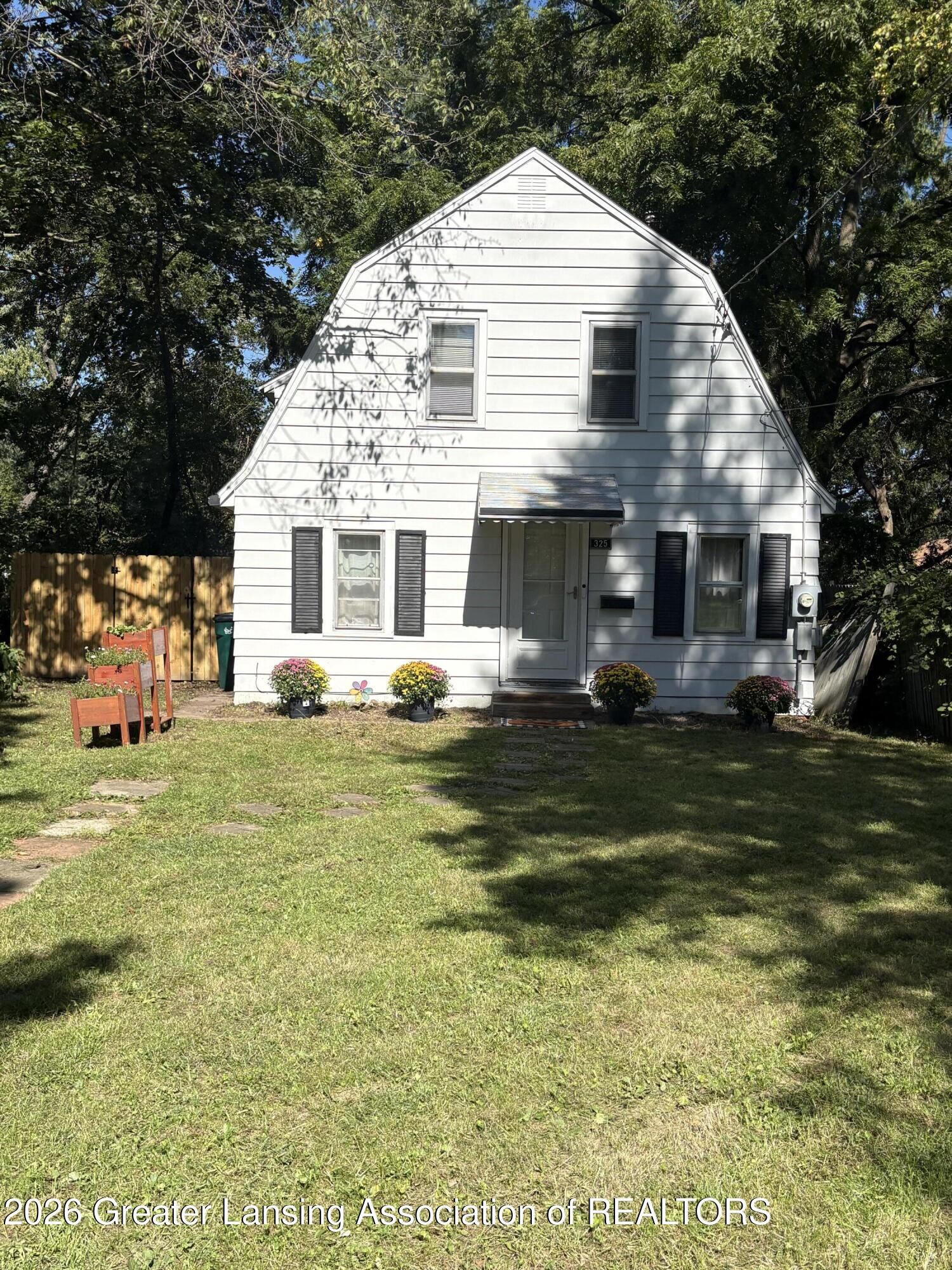 Property Photo:  325 Cox Boulevard  MI 48910 