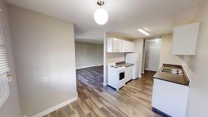 Property Photo:  10105 107 Avenue  AB T8V 1M1 