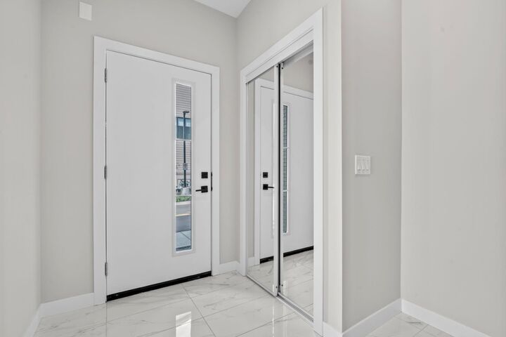 Property Photo:  8155 8 Avenue SW 203  AB T3H 6B1 