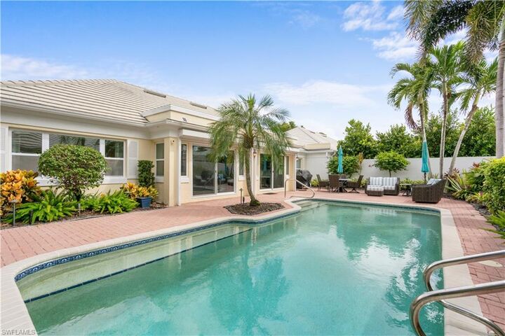 Property Photo:  807 Rue Deville 2.11  FL 34108 