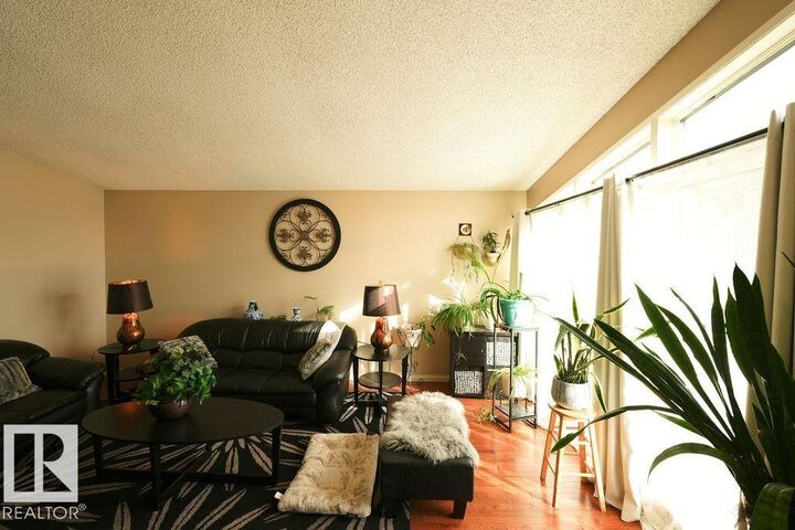 Property Photo:  13836 26 Street NW  AB T5Y 1B4 