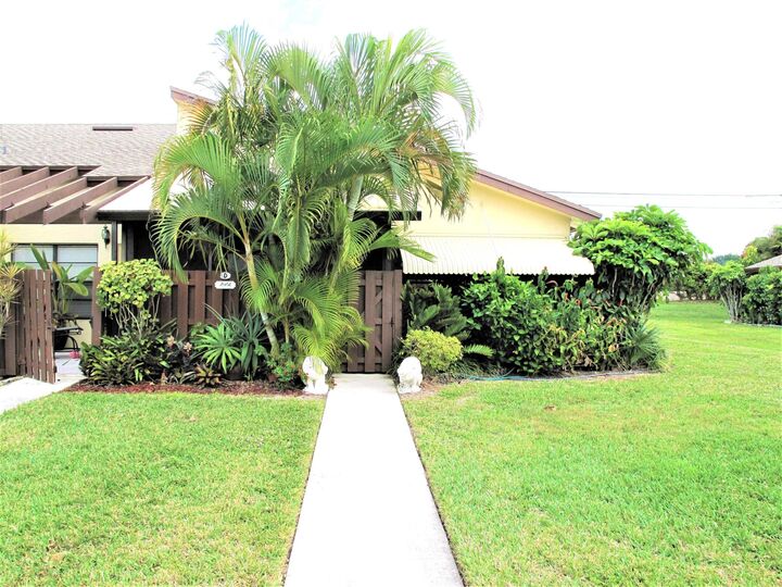 Property Photo:  5031 Nesting Way D  FL 33484 