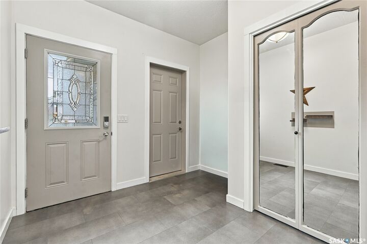 Property Photo:  1716 Clive Bay E  SK S4V 2R8 