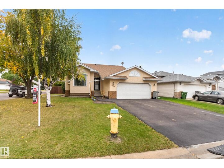 Property Photo:  9504 95 St SE  AB T8R 1K9 