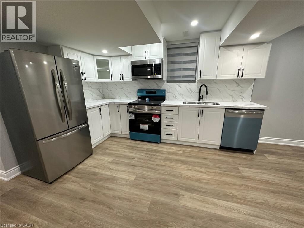 Property Photo:  906 Farmstead Drive Lower  ON L9T 8J5 