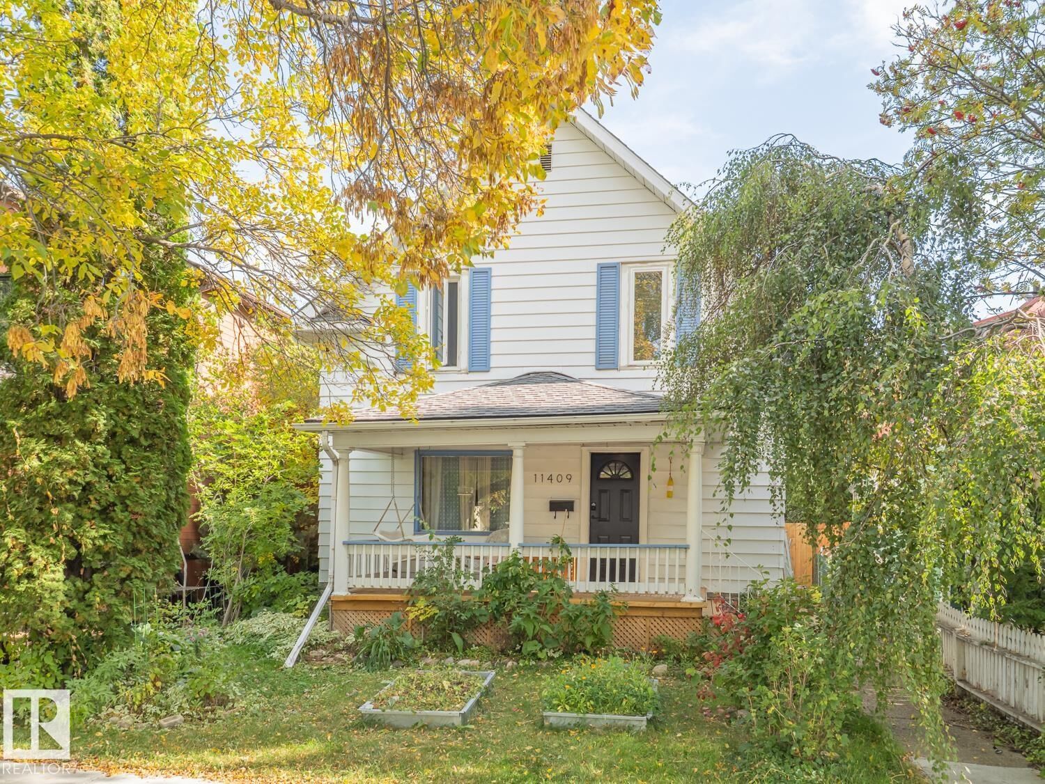 Property Photo:  11409 94 Street NW  AB T5G 1H5 