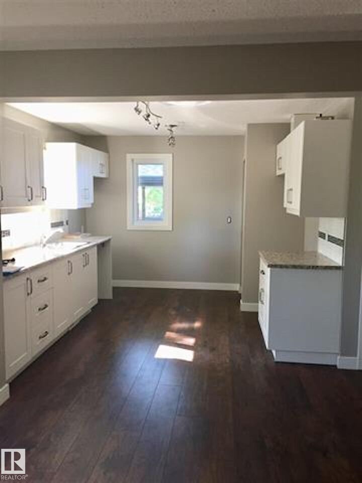 Property Photo:  11922 42 Street NW Upper  AB T5W 2N6 