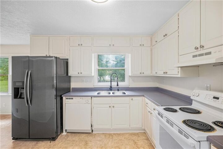 Property Photo:  1502 Shoal Creek Drive SW  GA 30094 